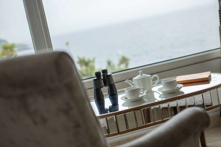 Royal Duchy Hotel Armada Room with Sea View and Tea Pot on Table with Binoculars