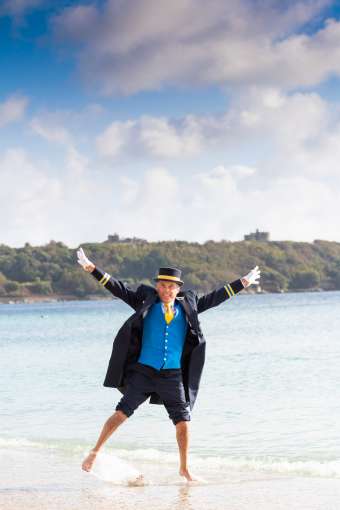 James doorman from duchy hotel on beach in Falmouth