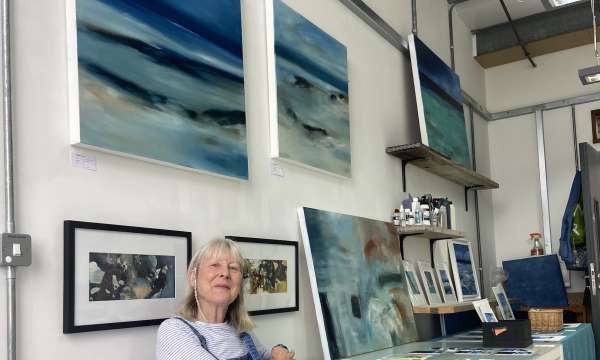 Artist Maggie Cochran in her studio