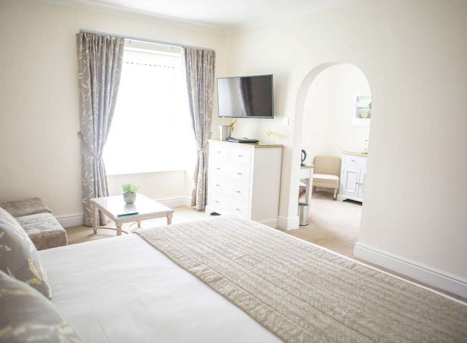 Royal Duchy Hotel Accommodation with Bed and Seating Area