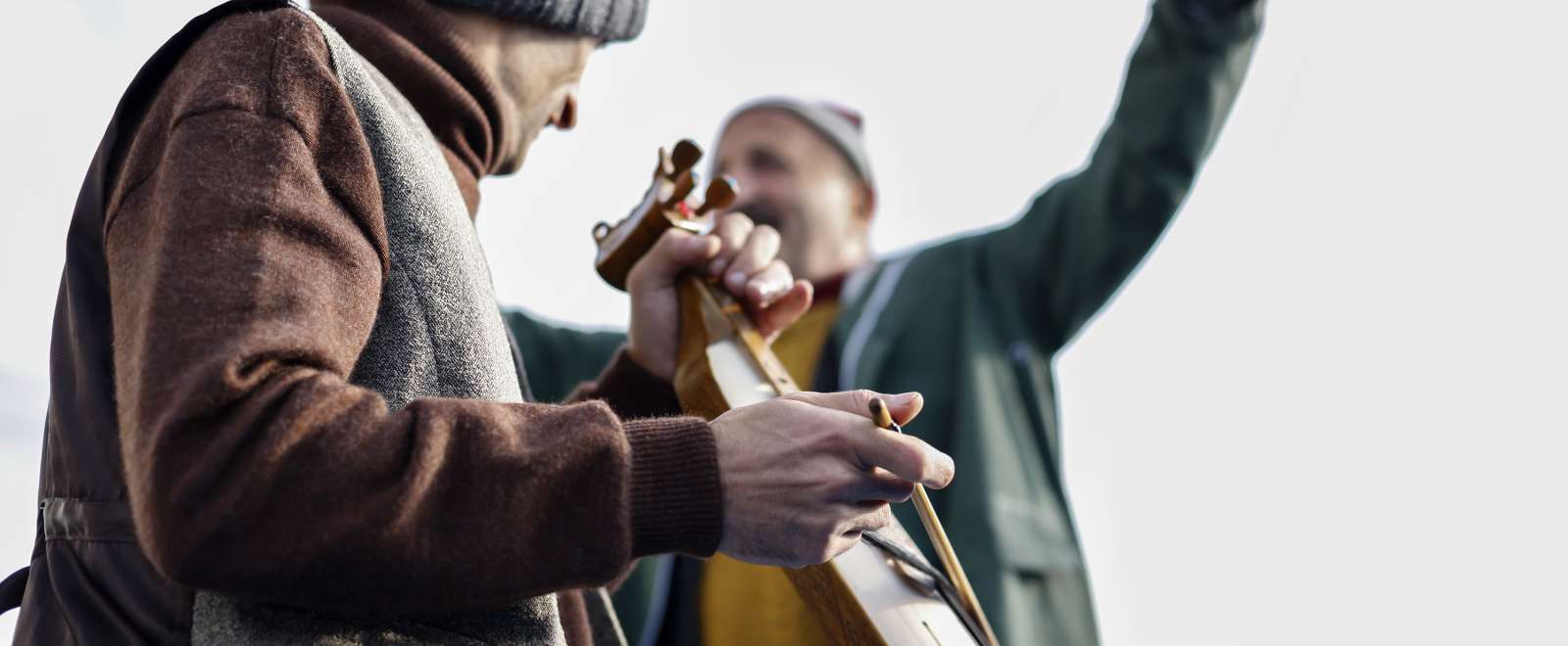 Musicians playing instruments outdoors