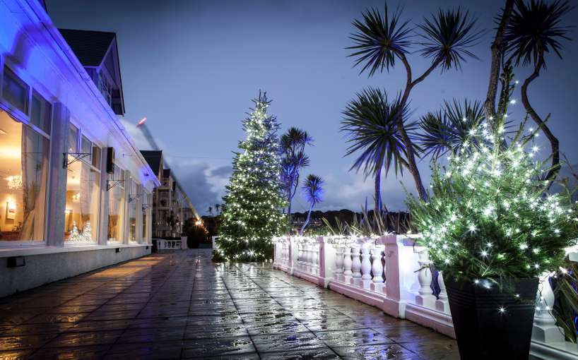 Decorated Christmas tree on the outside terrace of the Royal Duchy hotel in Falmouth