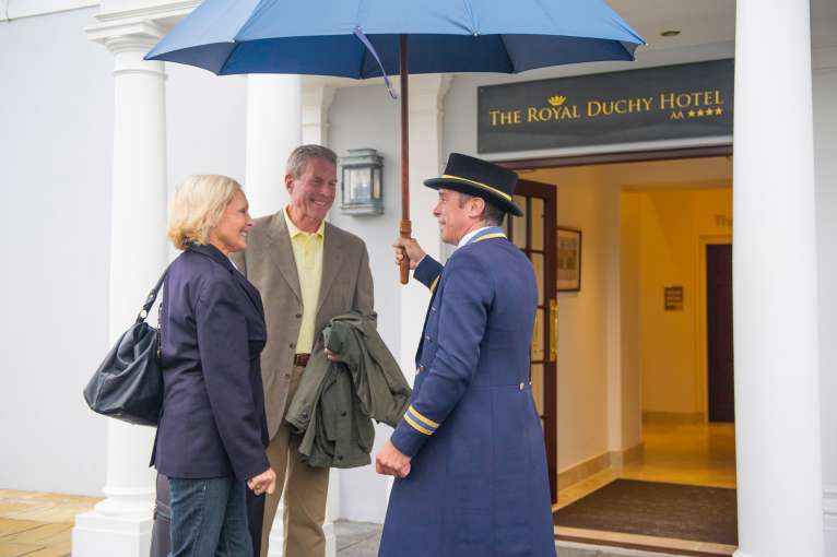 James welcoming guests