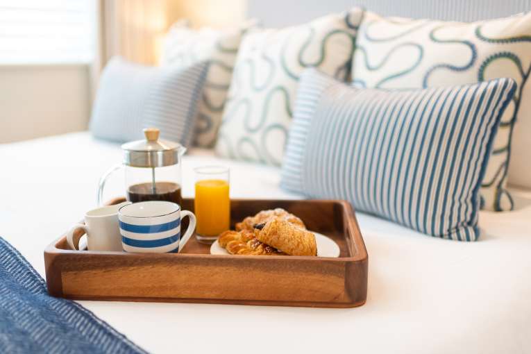 Tray on bed at The Royal Duchy Hotel