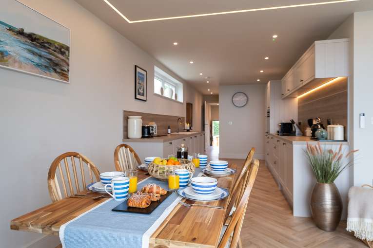 Dining table at The Duchy Beach House Laid out for Breakfast 