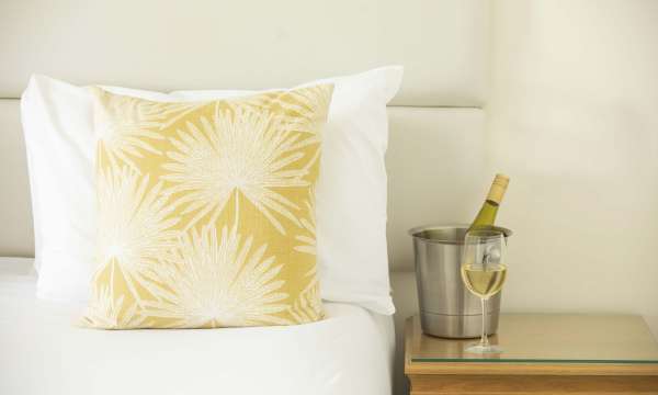 Royal Duchy Hotel Standard Sea View Room (117) Accommodation Wine by Bed with Cushion