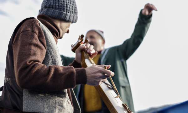 Musicians playing instruments outdoors