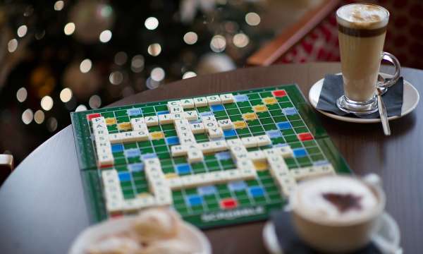 Festive hot drinks around a scrabble board