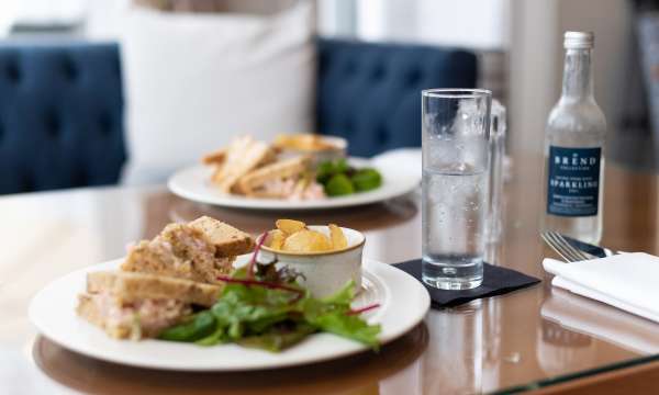 Fresh Sandwiches and drinks on a table 