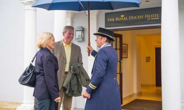 James welcoming guests 