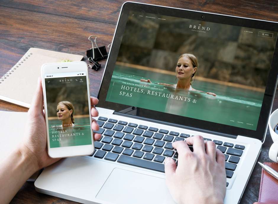 The new Brend Collection website home page displayed on a mobile and a laptop display