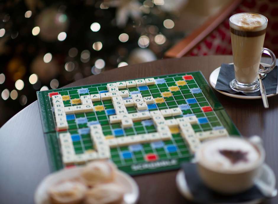 Festive hot drinks around a scrabble board