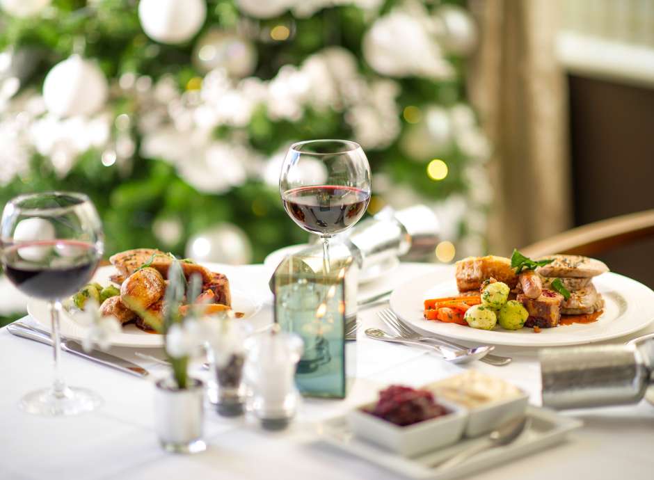 Restaurant table set for Christmas dinner