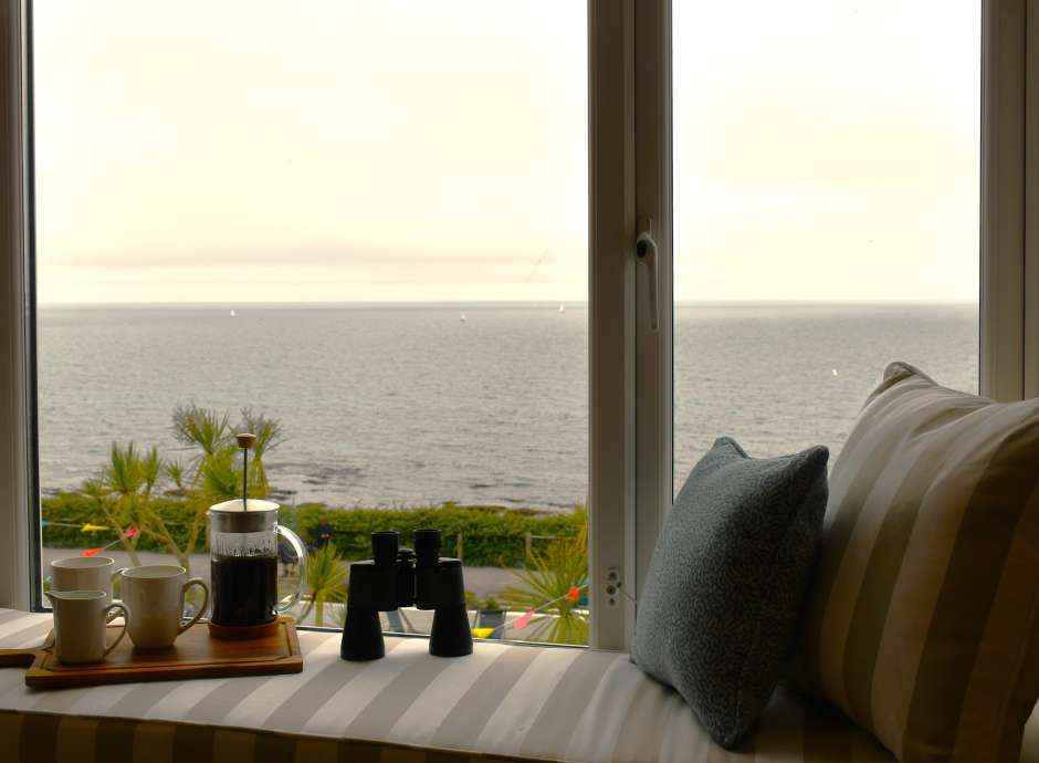 Window seat at The Duchy Beach House with the view of the beach