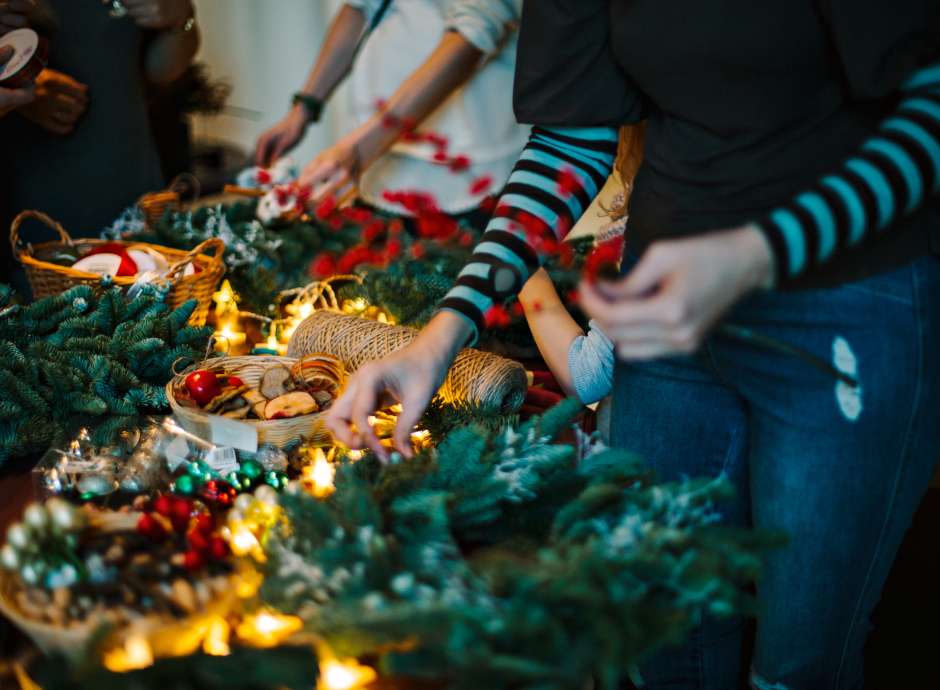 People making festive wreaths