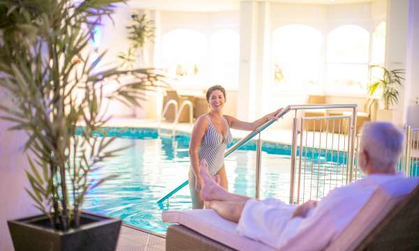 Guest in swimming pool at the Royal Duchy Hotel
