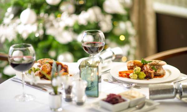 Restaurant table set for Christmas dinner