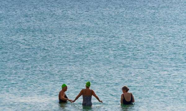 Cold water swimmers at Falmouth beach