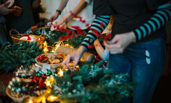 People making festive wreaths